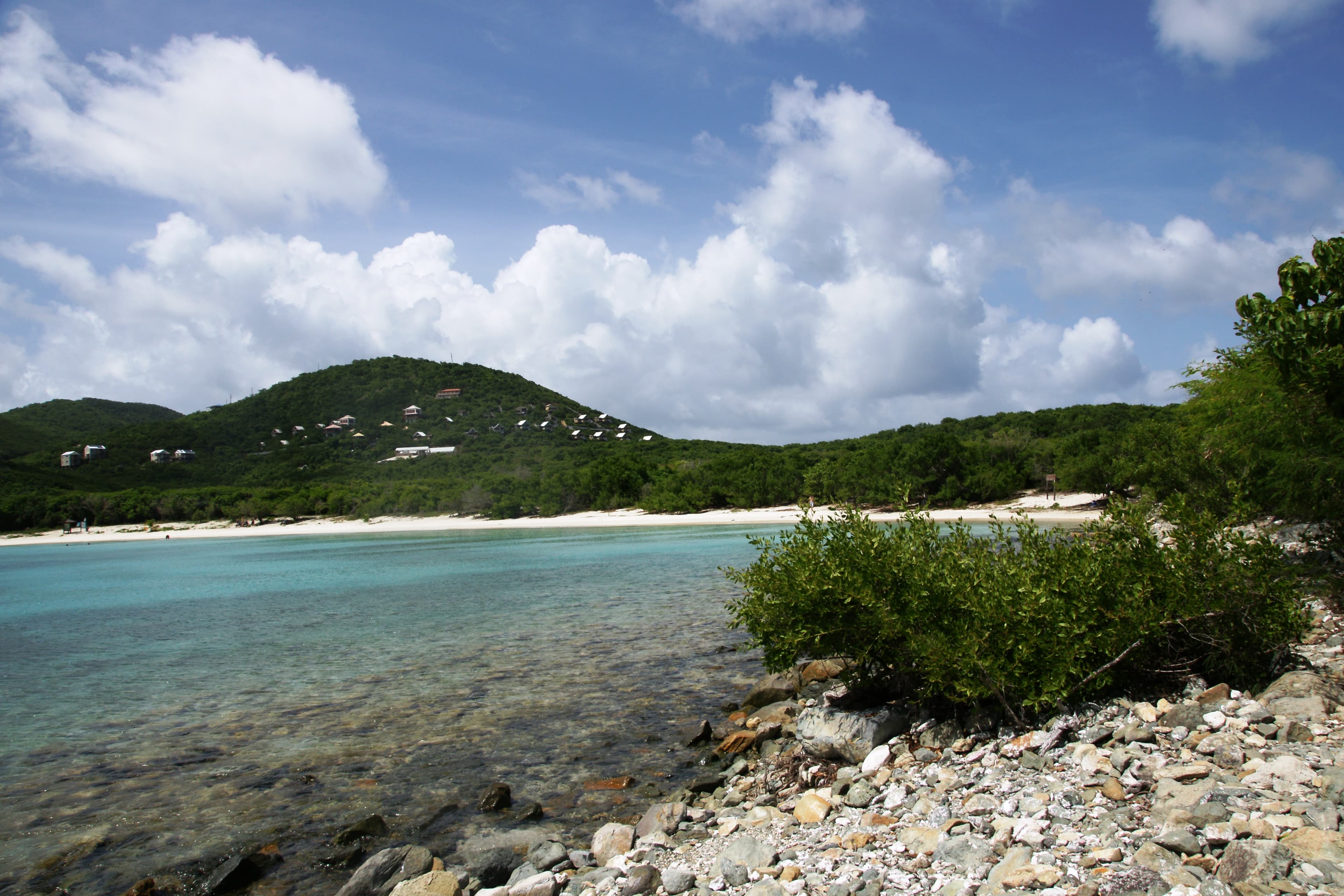 Salt Pond Bay’s sandy shoreline and green hillside seen across the water on St. John in 2011.