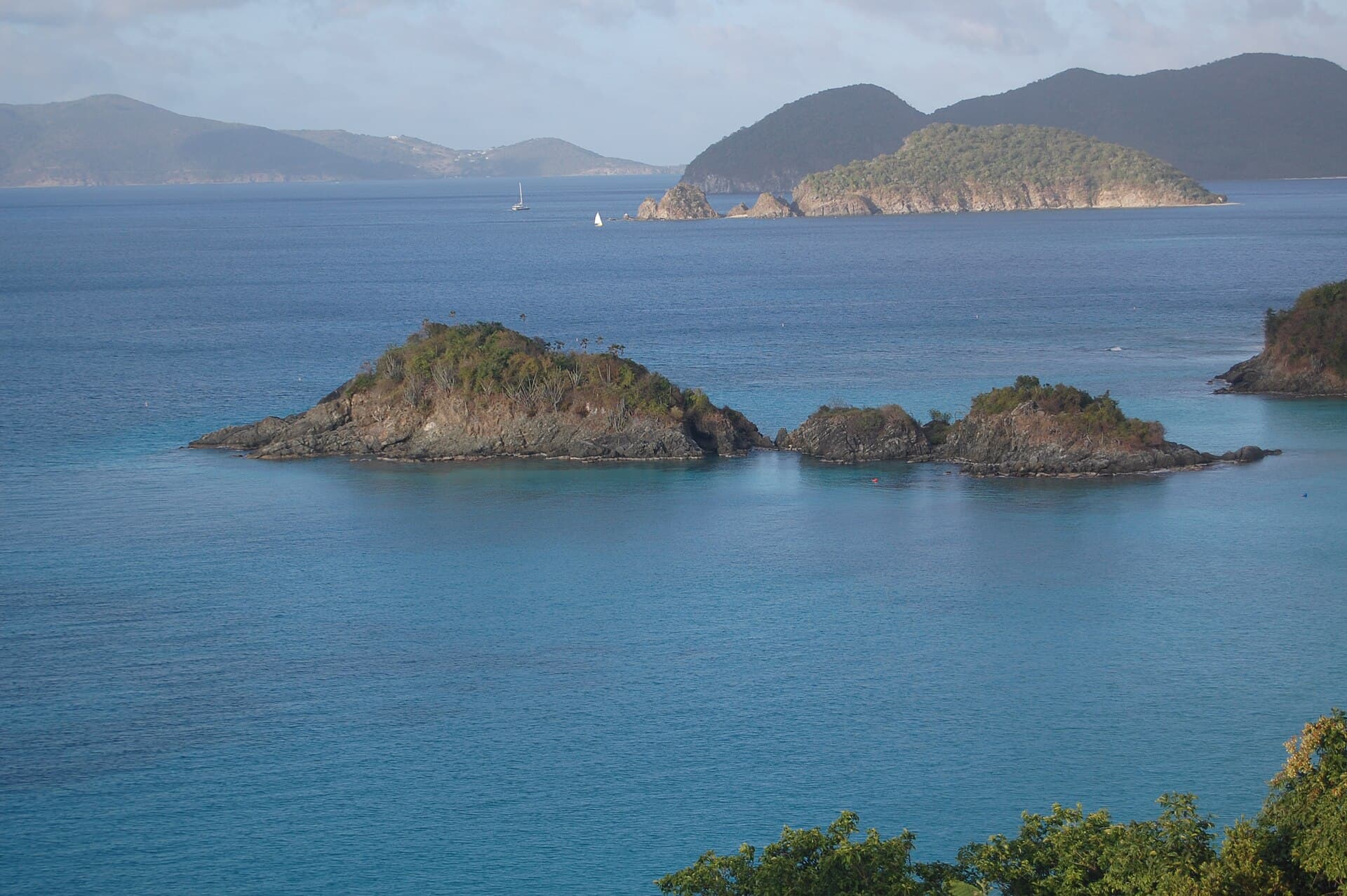 Trunk Bay on St. John, with Trunk Cay offshore in turquoise water.
