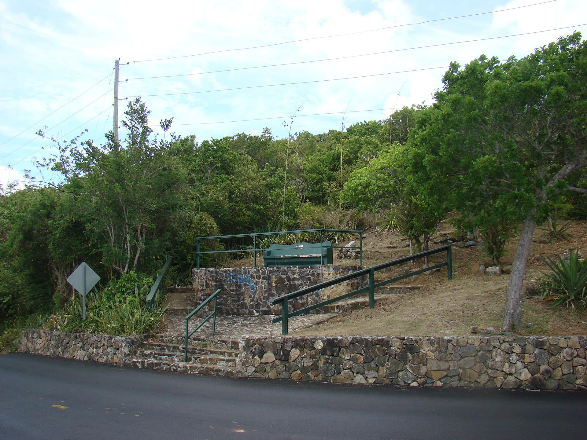 The roadside stone overlook platform and bench at Drake's Seat on St. Thomas.
