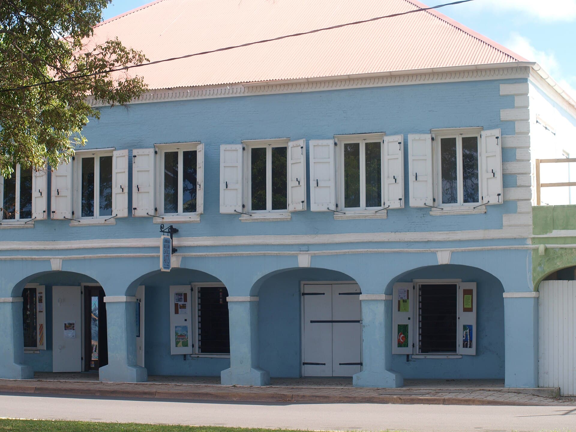 The blue arcaded facade of the Caribbean Museum Center for the Arts in Frederiksted, St. Croix.