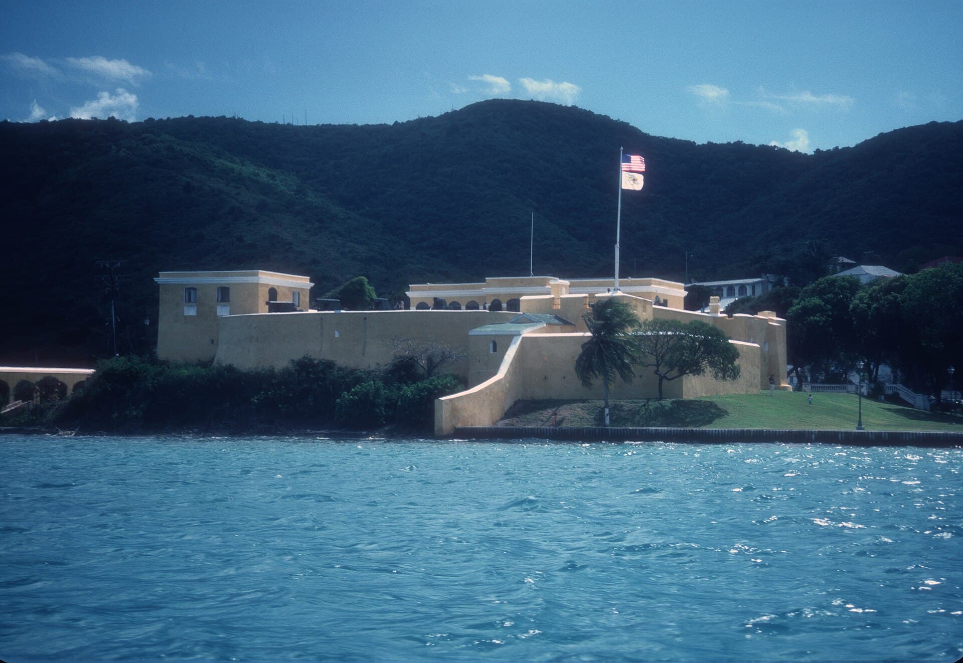 Fort Christiansvaern's yellow ramparts at Christiansted National Historic Site, seen from the harbor.