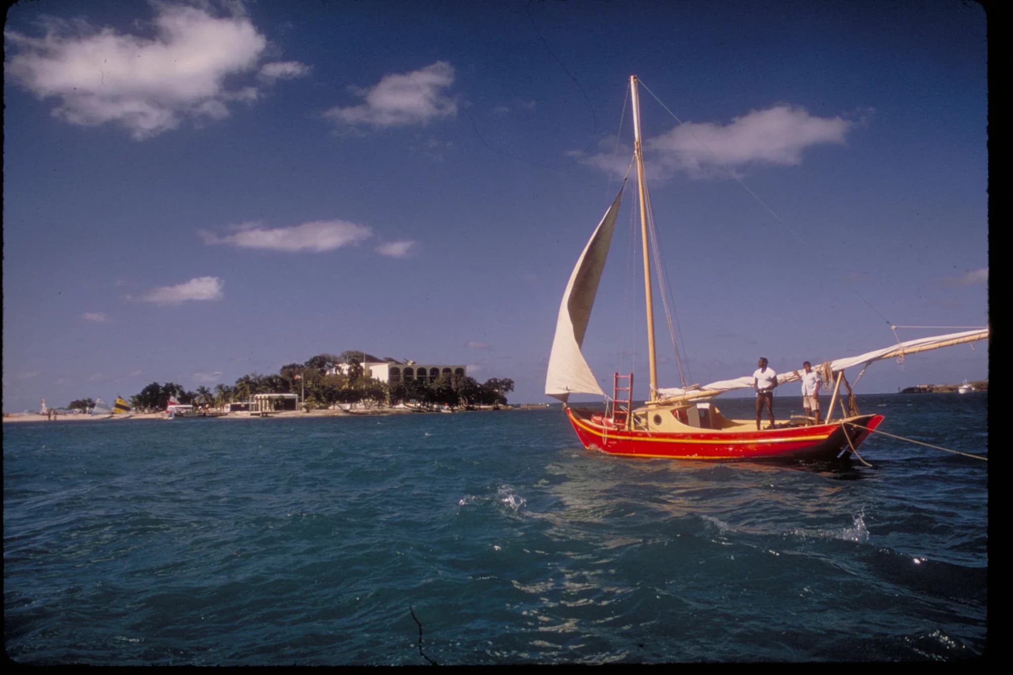 Sailboat near Buck Island Reef National Monument off St. Croix in clear Caribbean water
