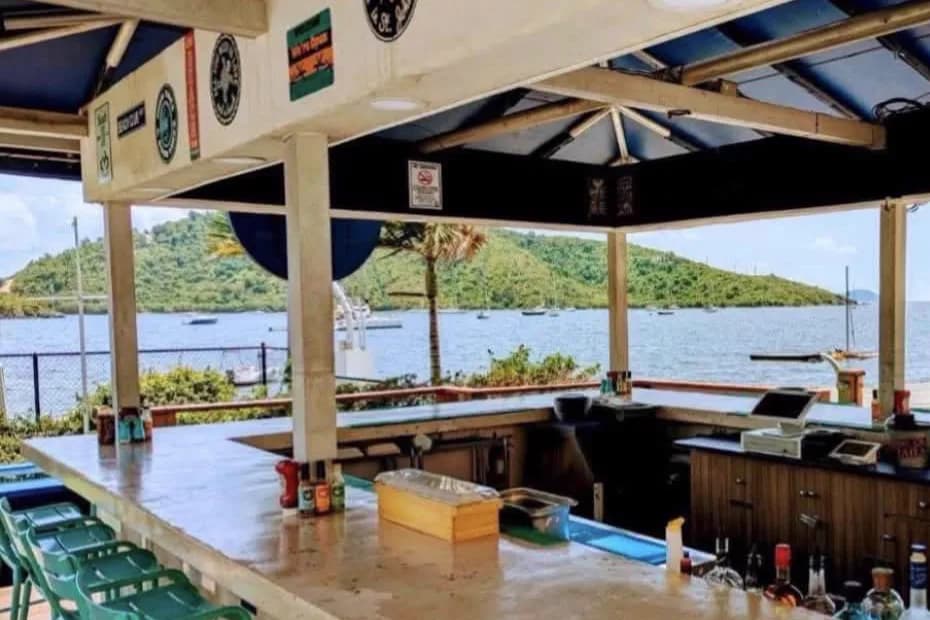 Surf Club Cantina's open-air bar overlooking Coral Bay.